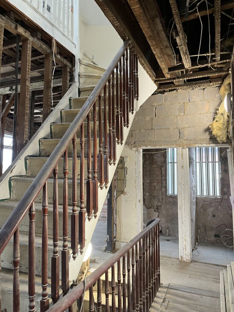 Retained period staircase at 267 Ballards Lane, Finchley, during the office conversion