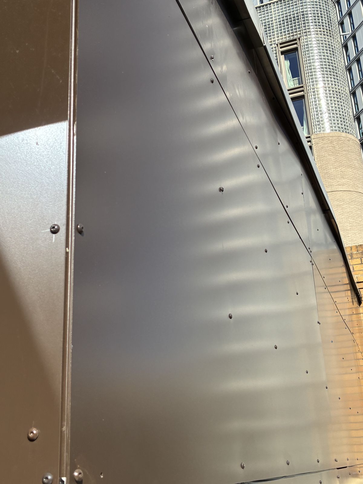 New bronze A2-rated rainscreen cladding panels at City Reach, Buckle Street, Aldgate